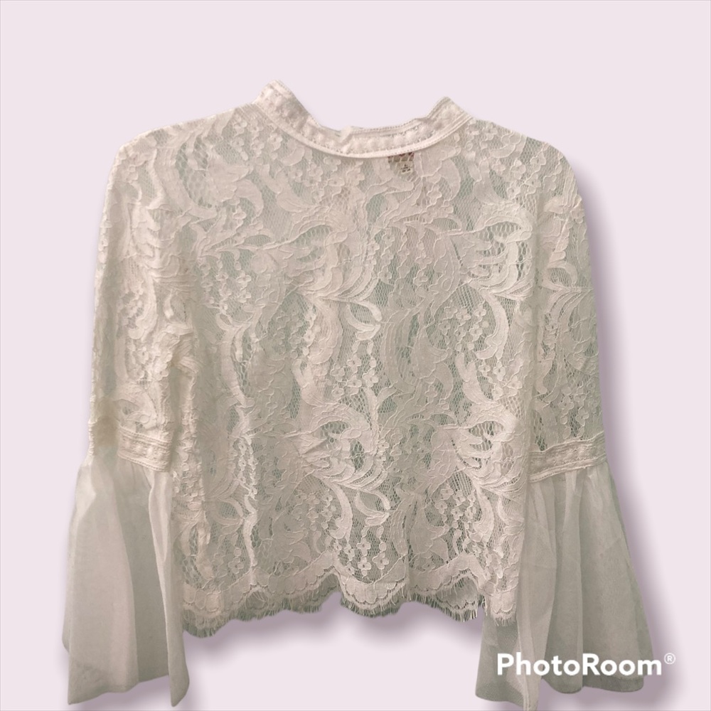White lace top with flared sleeves